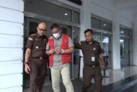 Dokumen foto terdakwa Jubel Tambunan saat dikenakan rompi oranye