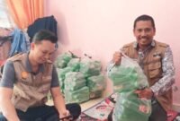 Relawan Zainuddin Purba - Hendro Susanto bantu korban Banjir di Kota Binjai, Rabu (09/10)