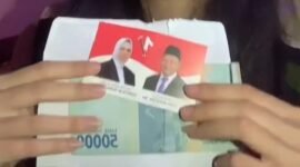 Cuplikan video yang memperlihatkan politik uang dari salah satu paslon