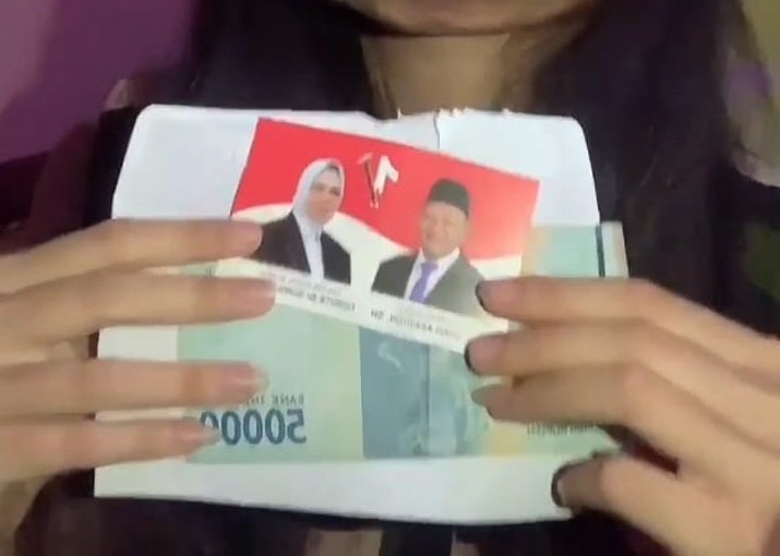 Cuplikan video yang memperlihatkan politik uang dari salah satu paslon