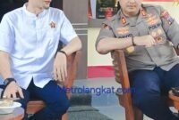 Kapolres Langkat AKBP David Triyo Prasojo, SH, SIK, M.Si saat bincang-bincang dengan Ketua PWI Langkat, Darwis Sinulingga dan Insan Pers Jum'at (20/12) pagi dalam agenda Kopi Morning.(photo Erwin)