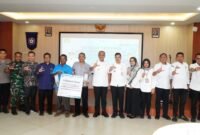 Pj Bupati Langkat Hadiri Serah Terima Lampu Penerangan Jalan Desa Sei Siur dan Tanjung Pasir.(ist)
